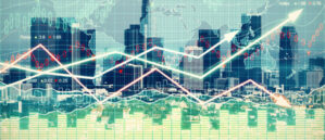 Financial Crisis 900x387 An abstract representation of financial markets, featuring upward-trending graphs overlaying a city skyline with a world map background.