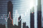 A digital chart with candlestick graph overlays a blurred cityscape, representing financial data analysis or stock market trends.
