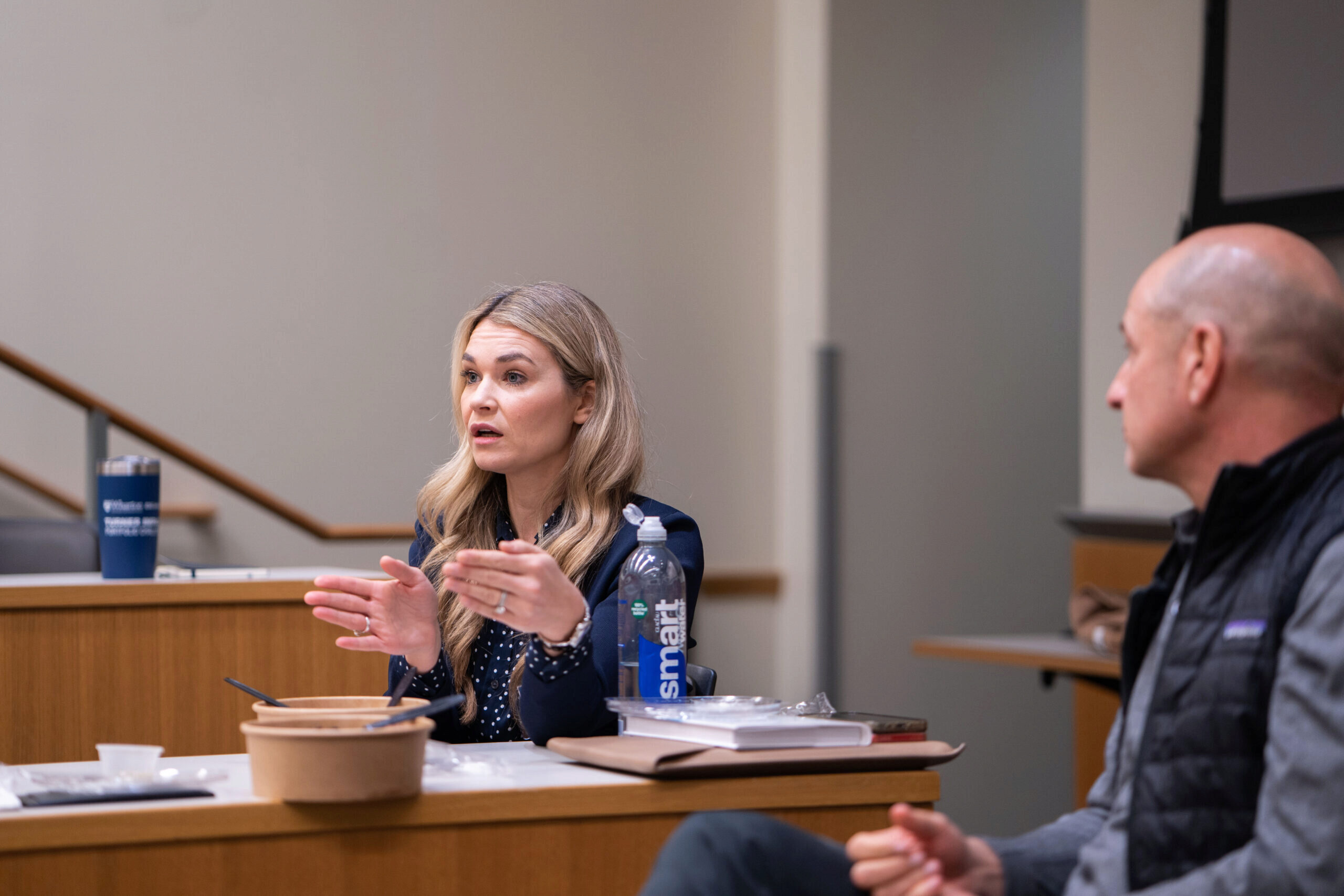 Sarah Norman and Bobby Turner in a classroon speaking to a group of TIPC students (not pictured)
