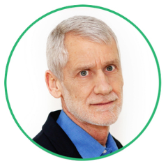 Keith Weigelt Headshot of a person with short, gray hair and a beard, wearing a blue shirt and dark jacket, set against a white background with a green circular border.