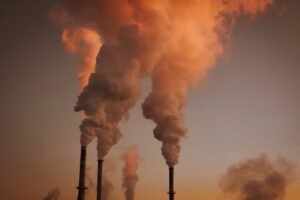 Industries,High,Smokestacks,With,Smoke,Emission.,Industrial,Factory,Pollution,,Smokestack Smokestacks emitting smoke in the air