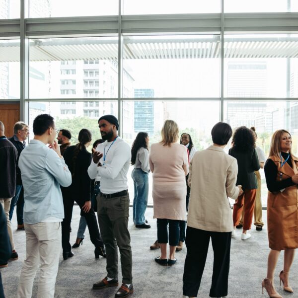 Stock image of people networking in a professional setting