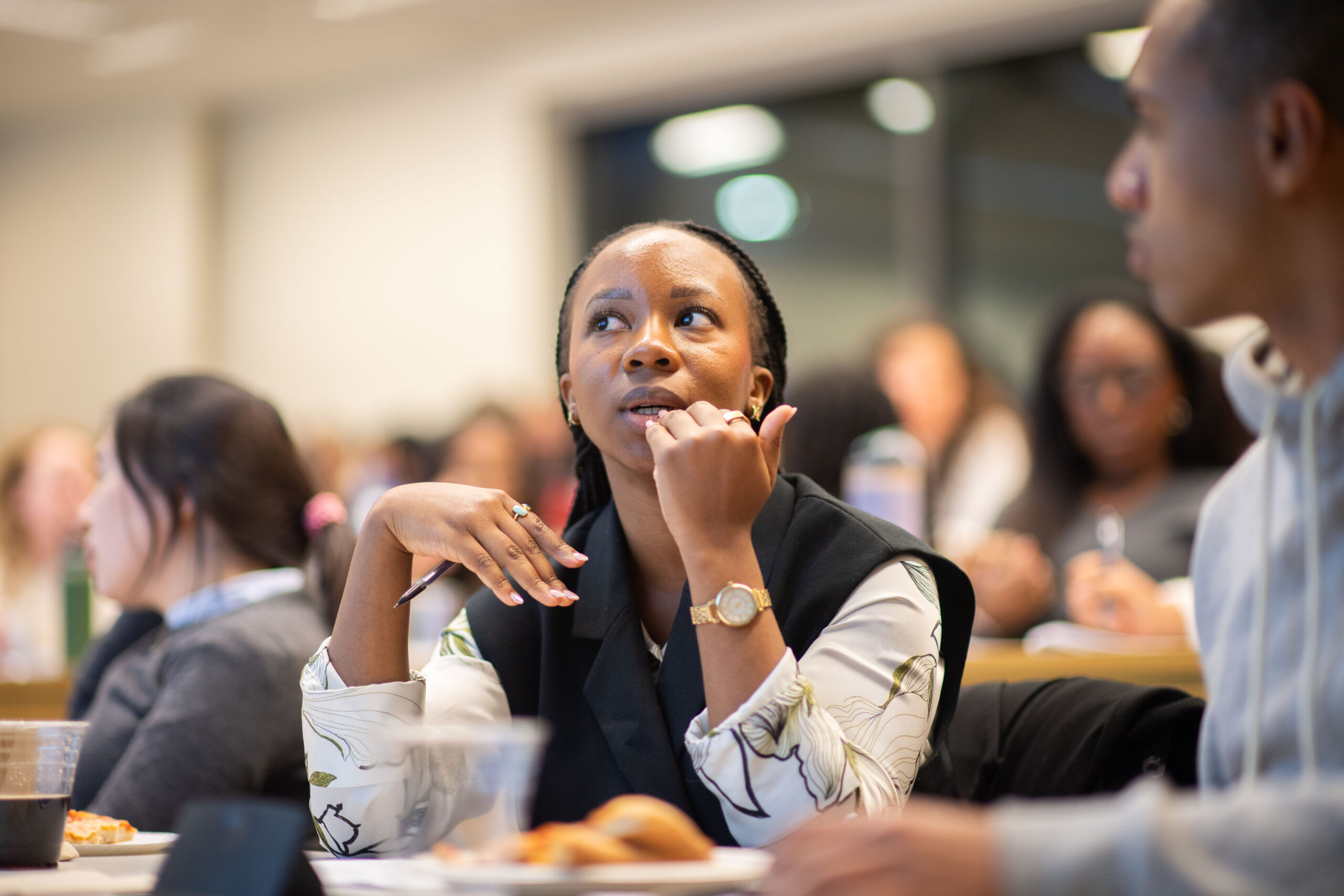 Close up photo of a student sitting in a classroom